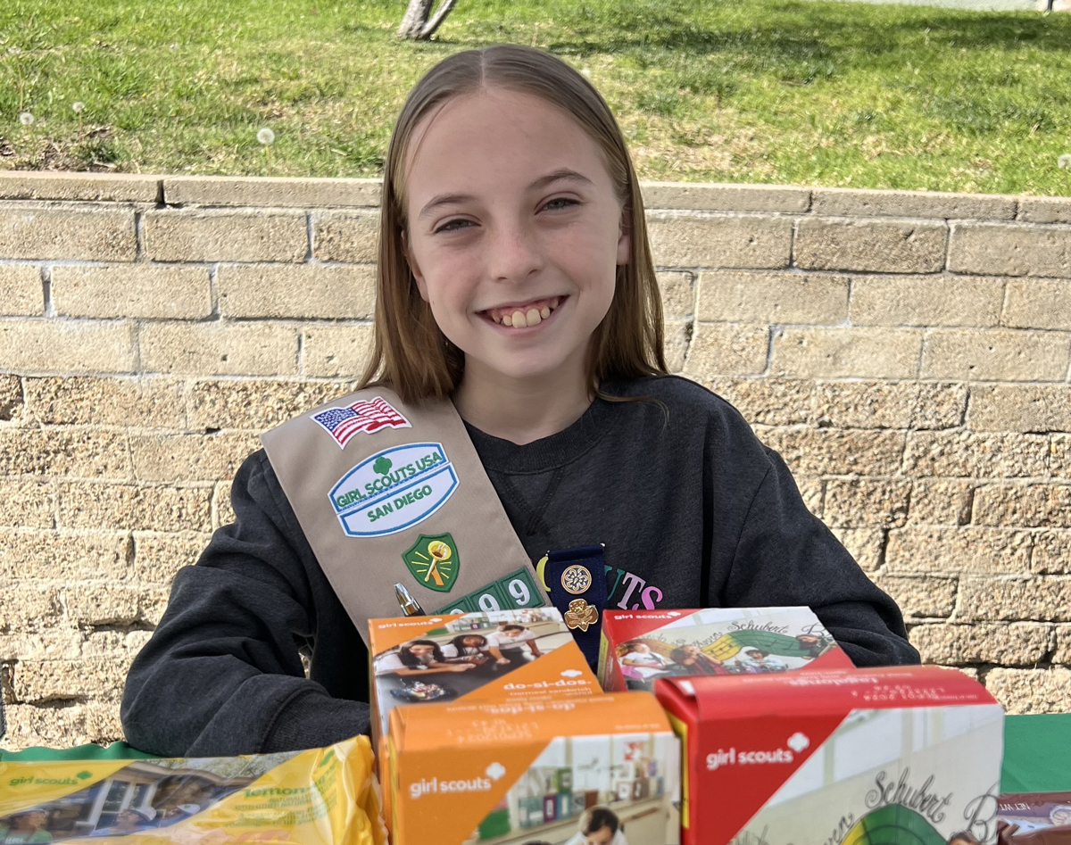 Addie is ready to sell you Girl Scout Cookies!
